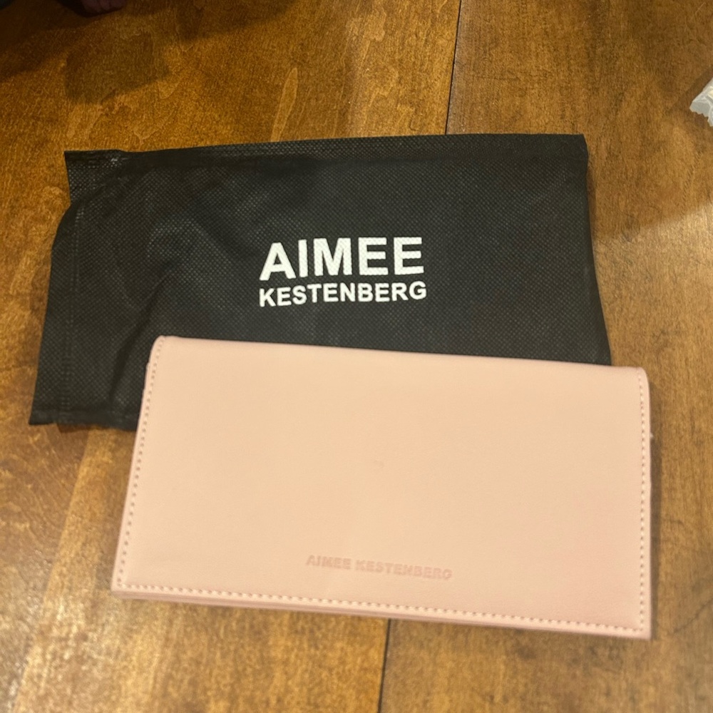 Brand new Amy Kestenberg pink vegan leather wallet